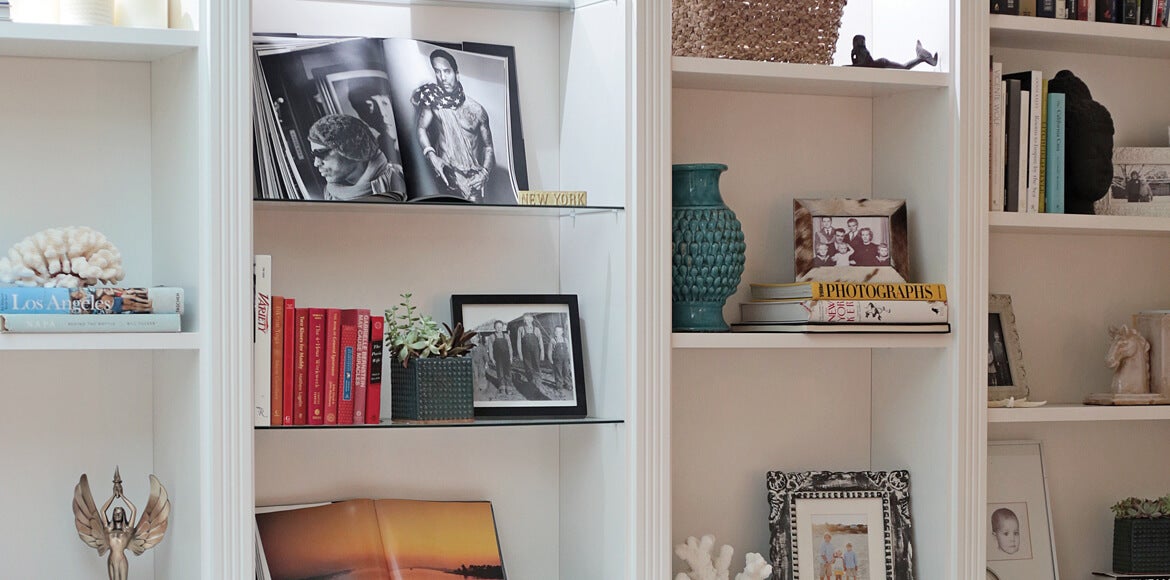 White Living Room Storage System with Glass Shelves