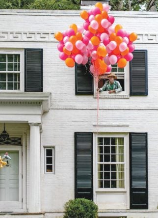 Jason Oliver Nixon and John Loecke in front of their North Carolina Regency-style home