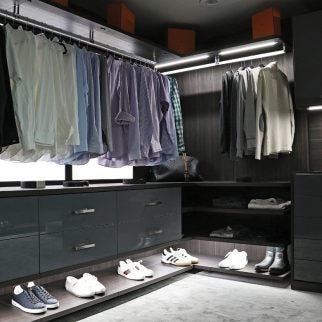 Dark modern walk in closet