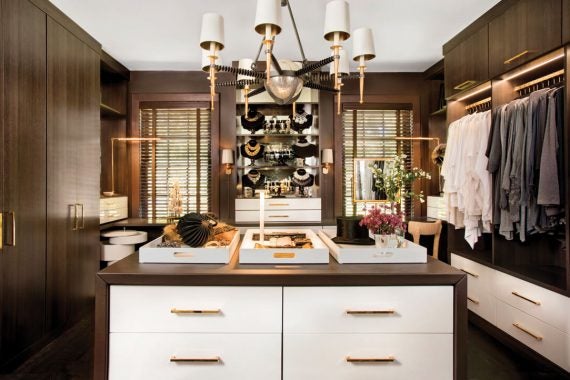 Eighty Pair Showcase closet with brass hardware