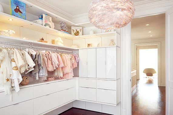 Nursery space with gloss white cabinets