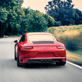 Red Porsche 911 on Road