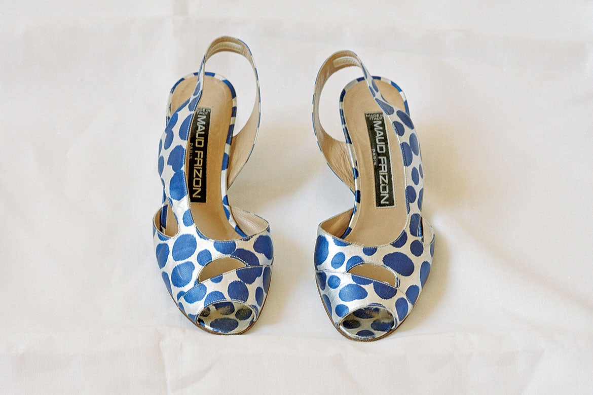 Close up of blue and white spotted shoes