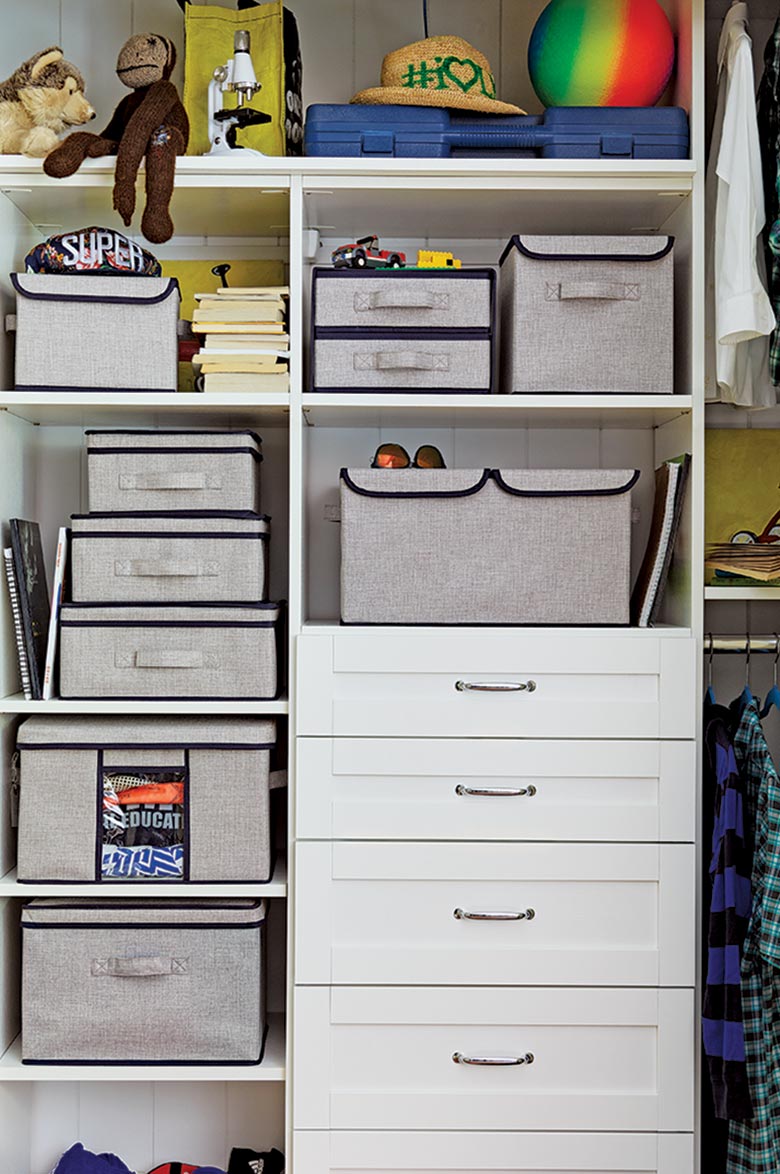 Spreading out classic white finish closet space with stainless steel hardware