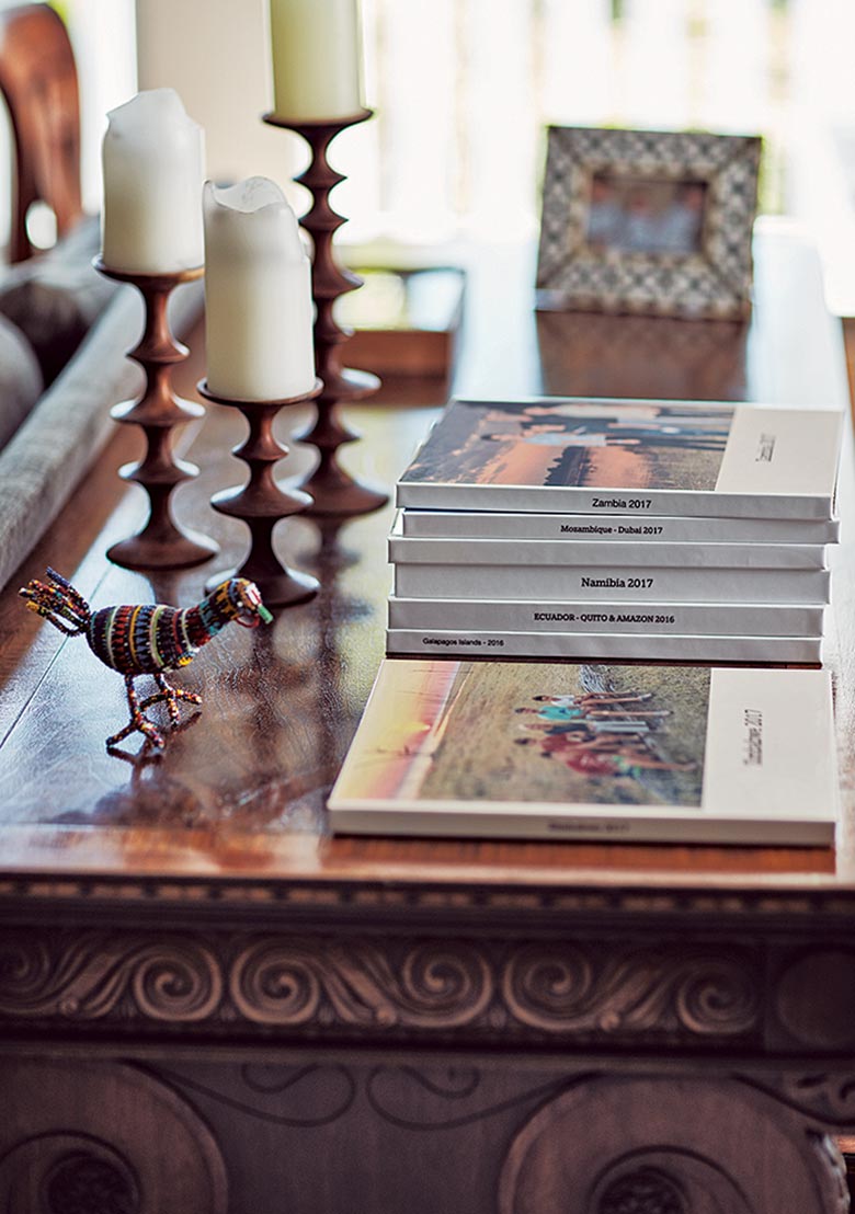 spreading out close up of wooden table and book stack