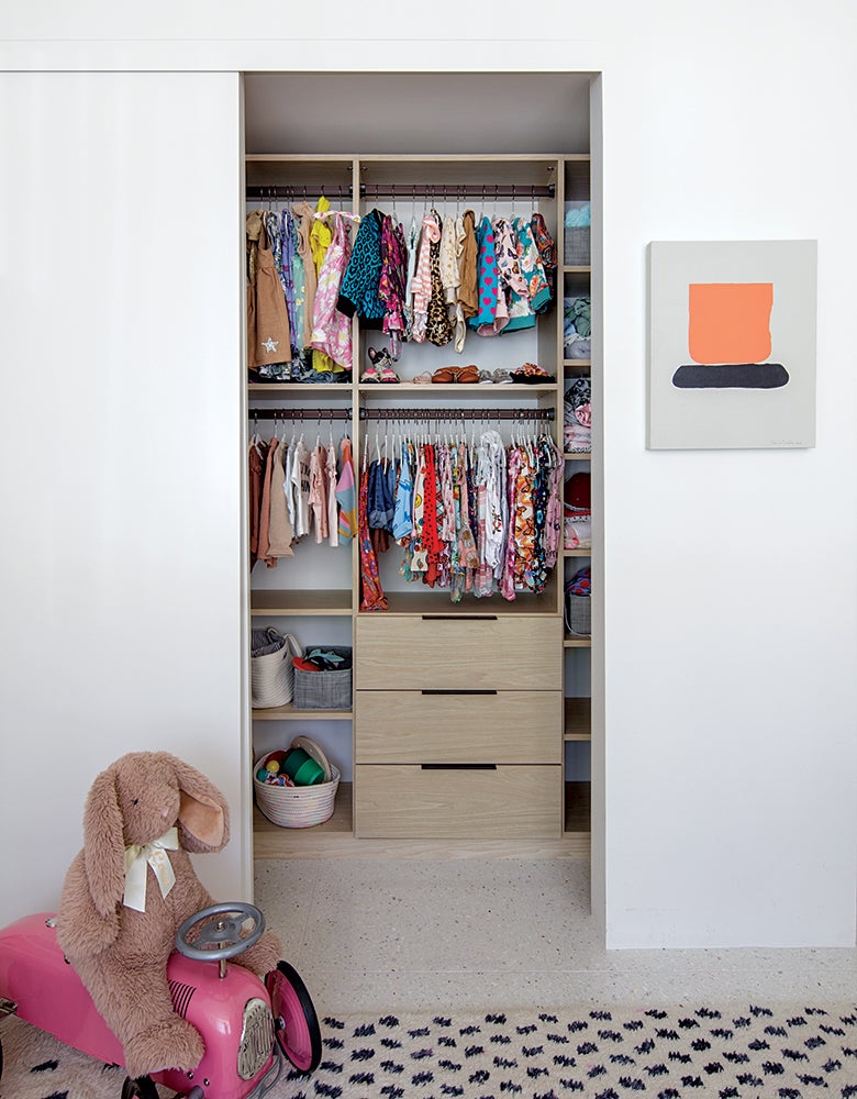 Custom kids walk in closet for Matt Sorum and Ace Harper created by California Closets